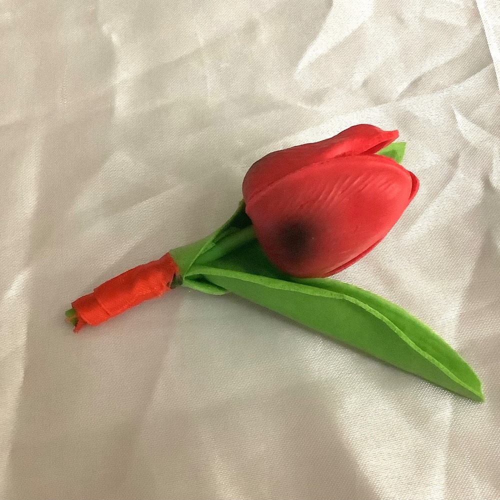 real touch tulip boutonniere…..you choose color